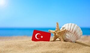 Turkish Flag on the Sand – Antalya Beach Holiday Packages