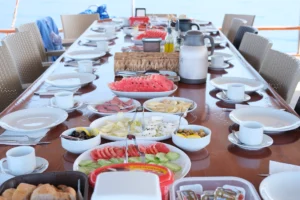 Traditional Turkish breakfast served on deck of a gulet during Blue Cruise Turkey.
