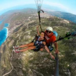 Paragliding over Oludeniz Blue Lagoon during the Olympos to Fethiye Blue Cruise in Turkey
