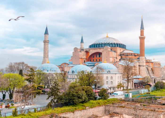 Hagia Sophia exterior view with minarets and flying seagull Istanbul