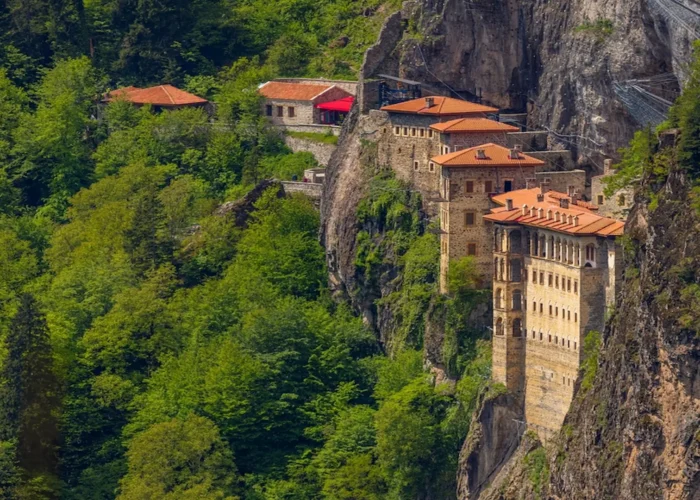 Sumela Monastery perched on steep cliffs surrounded by lush forest in Trabzon