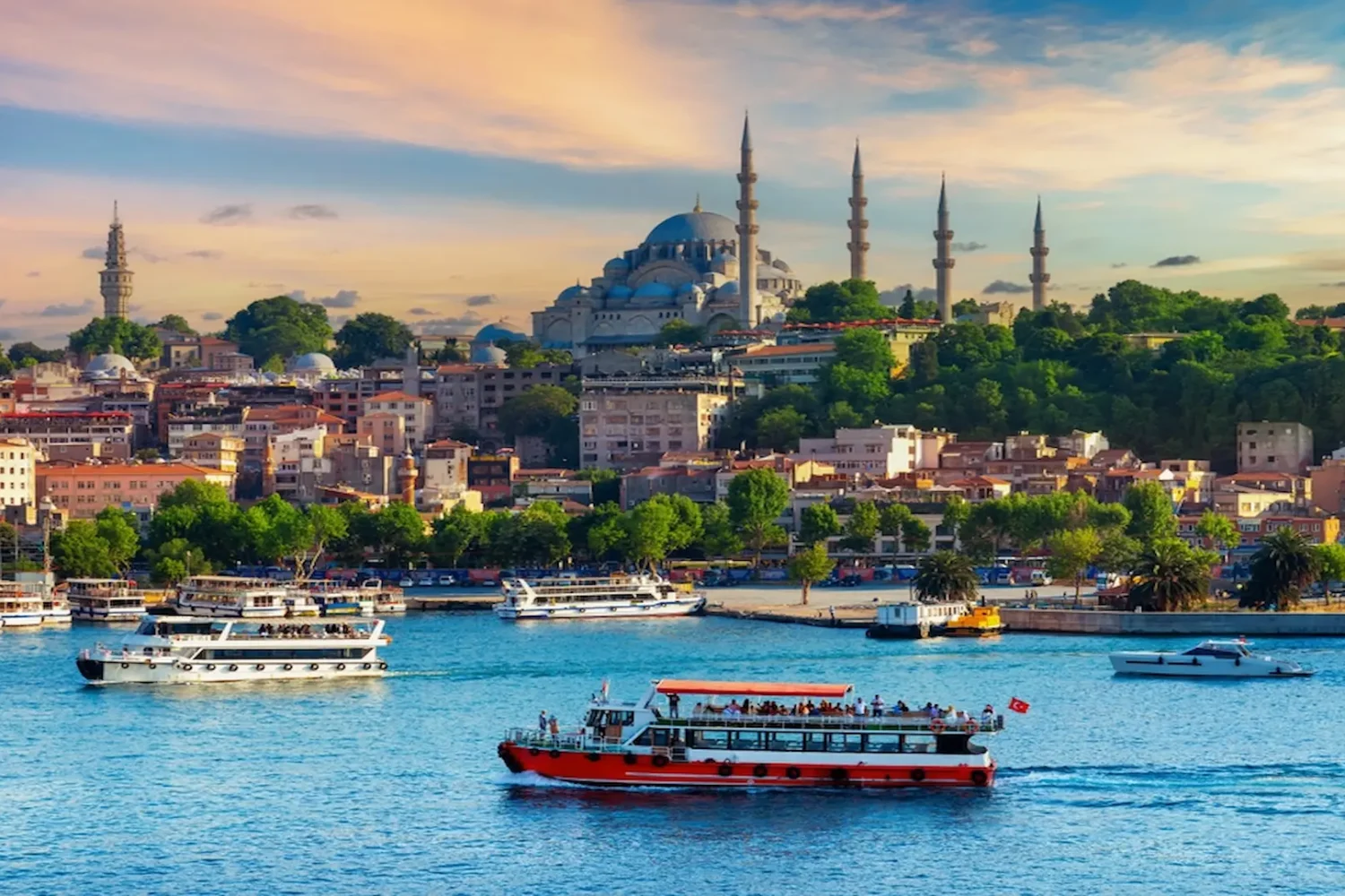 Boats sailing on the Bosphorus with Suleymaniye Mosque in the background