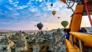 Hot air balloons floating during Cappadocia sunset