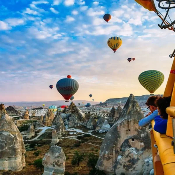 Hot air balloons floating during Cappadocia sunset