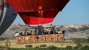 Tourists inside a Cappadocia hot air balloon basket