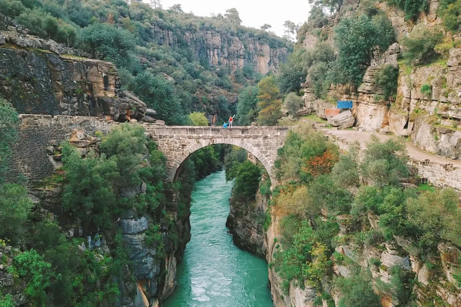 Aerial view of Roman bridge over turquoise Koprulu Canyon river Antalya