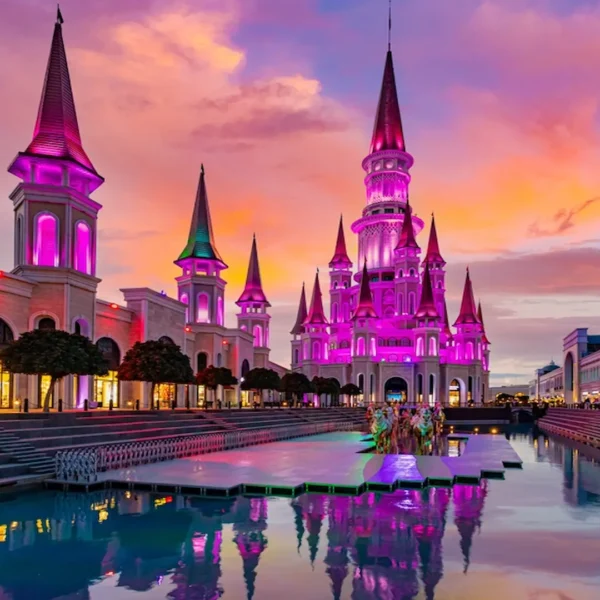 Colorful night lights on castle towers at Land of Legends Antalya