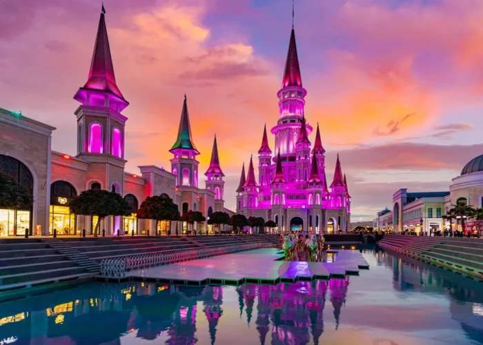 Colorful night lights on castle towers at Land of Legends Antalya