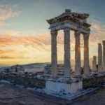 Temple of Trajan ruins in Pergamon with golden sunset sky