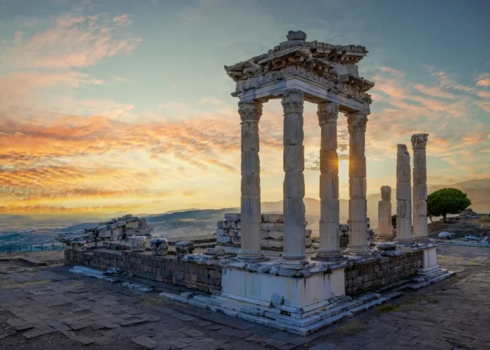 Temple of Trajan ruins in Pergamon with golden sunset sky