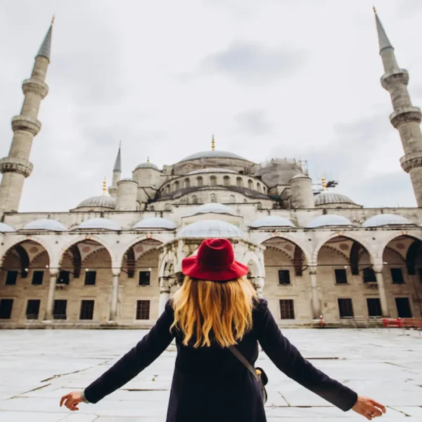Visitor admiring the courtyard of the Blue Mosque in Istanbul