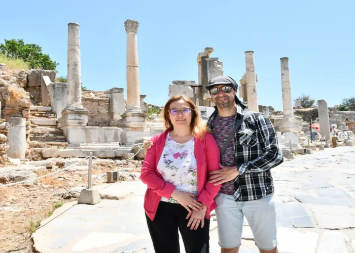 Couple exploring ancient Roman temples in Ephesus