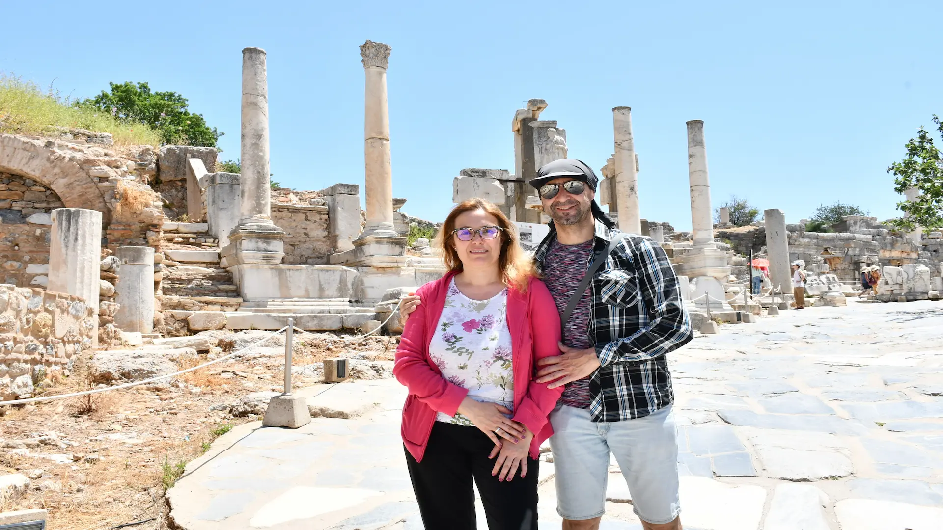 Couple exploring ancient Roman temples in Ephesus