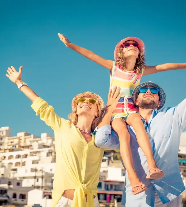 Family enjoying sunshine and blue skies during Turkey beach vacation