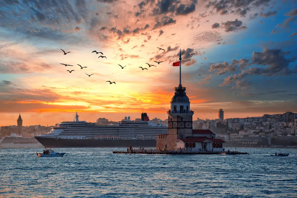 Cruise ship near Maiden’s Tower during sunset on Istanbul shore excursion