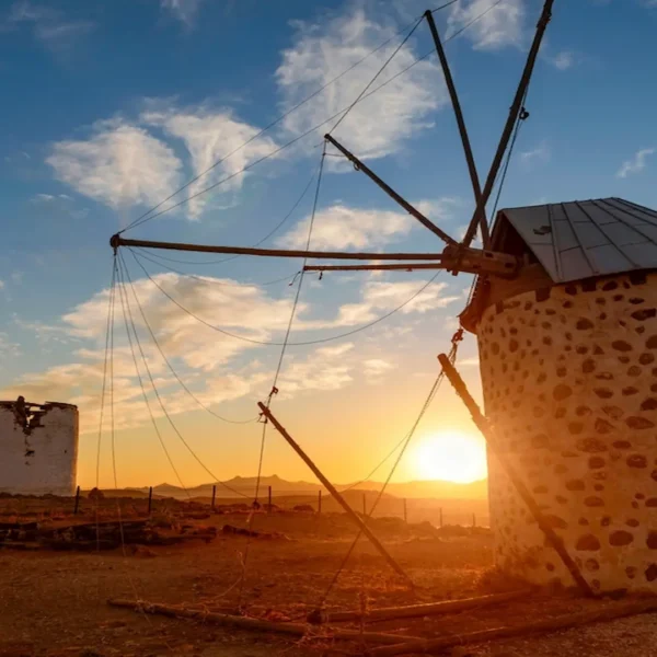 Historic Bodrum windmills with a golden sunset view